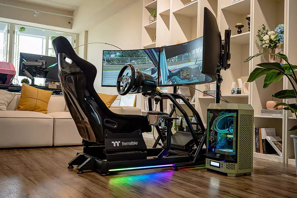 Professional sim racing cockpit with triple curved displays, racing seat and gaming PC